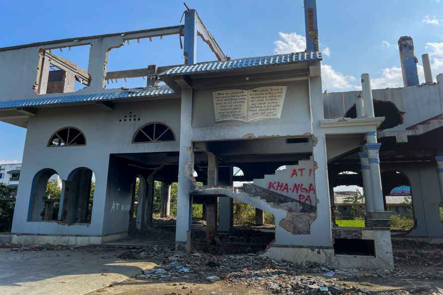 **EDS: IMAGE TO GO WITH STORY** Imphal: Remains of a house razed...