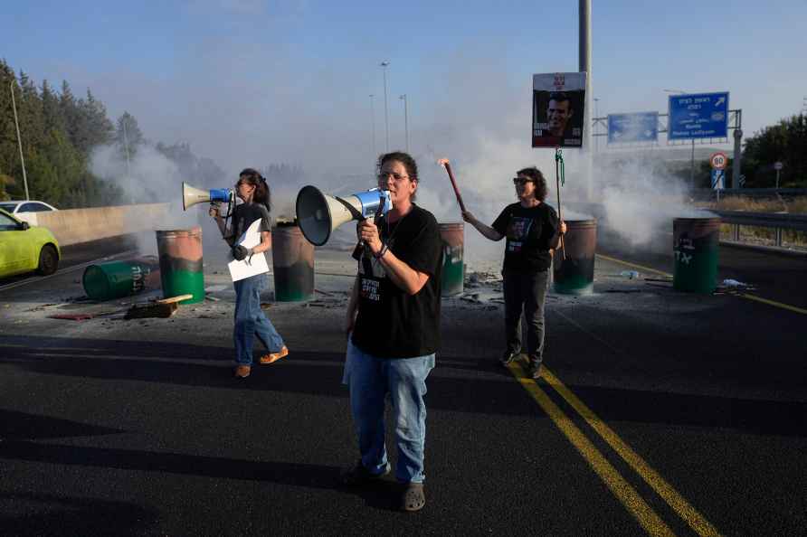 Relatives of hostages held in the Gaza Strip block Highway