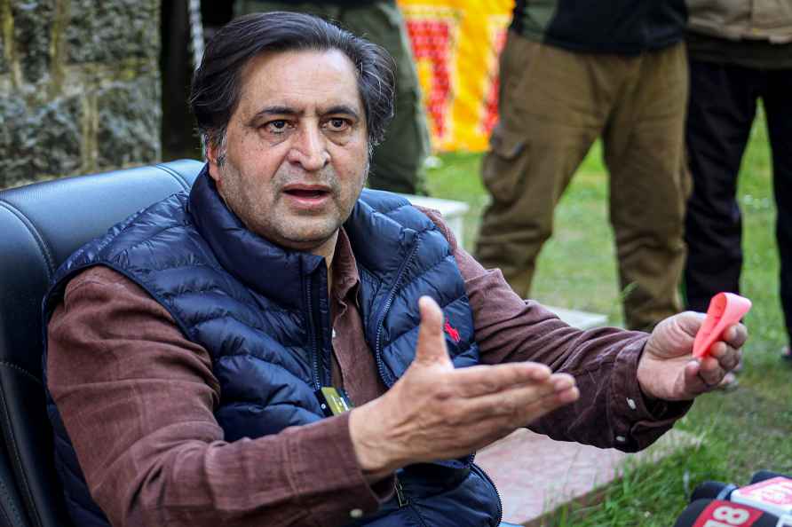 Sajad Lone addresses press