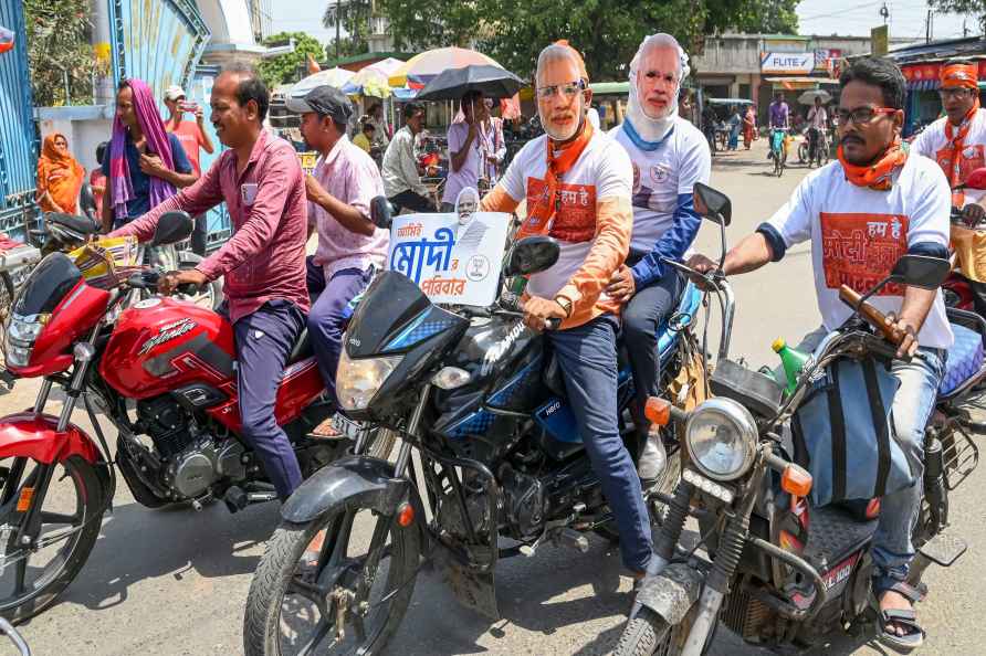 Nadia: BJP supporters take part in an election rally for Lok Sabha...