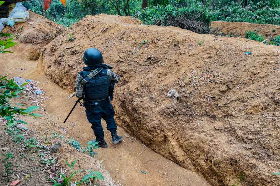 **EDS: TO GO WITH STORY** Imphal: A 'village volunteer' stands guard...