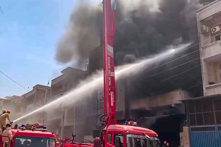 **EDS: SCREENSHOT VIA PTI VIDEO** New Delhi: Firefighters douse ...