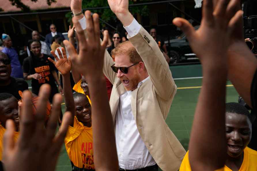 Prince Harry, chants with children during the Giant of Africa Foundation...