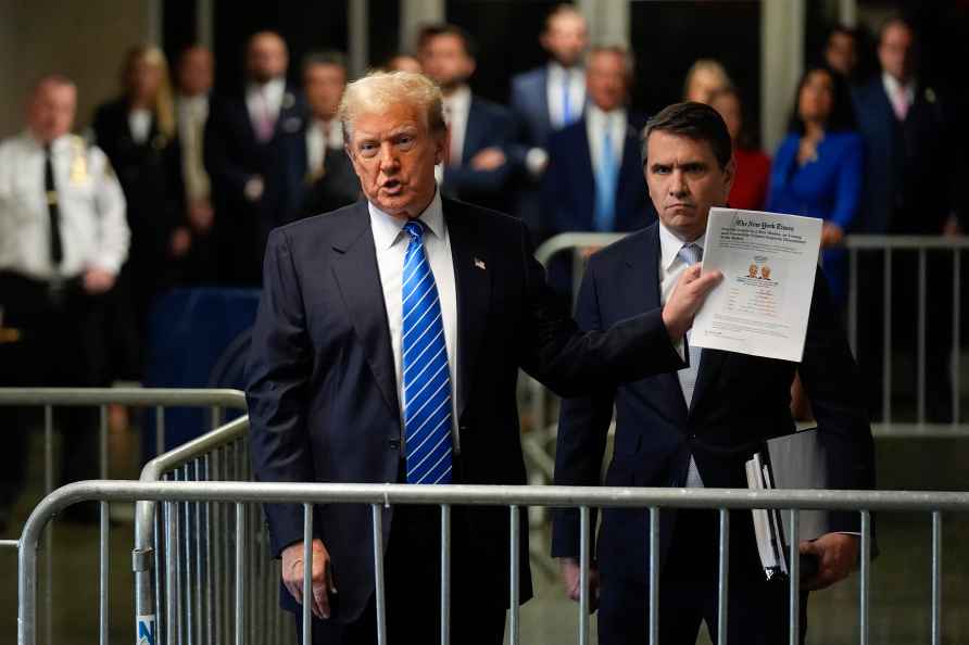 Former President Donald Trump speaks to members of the media upon...