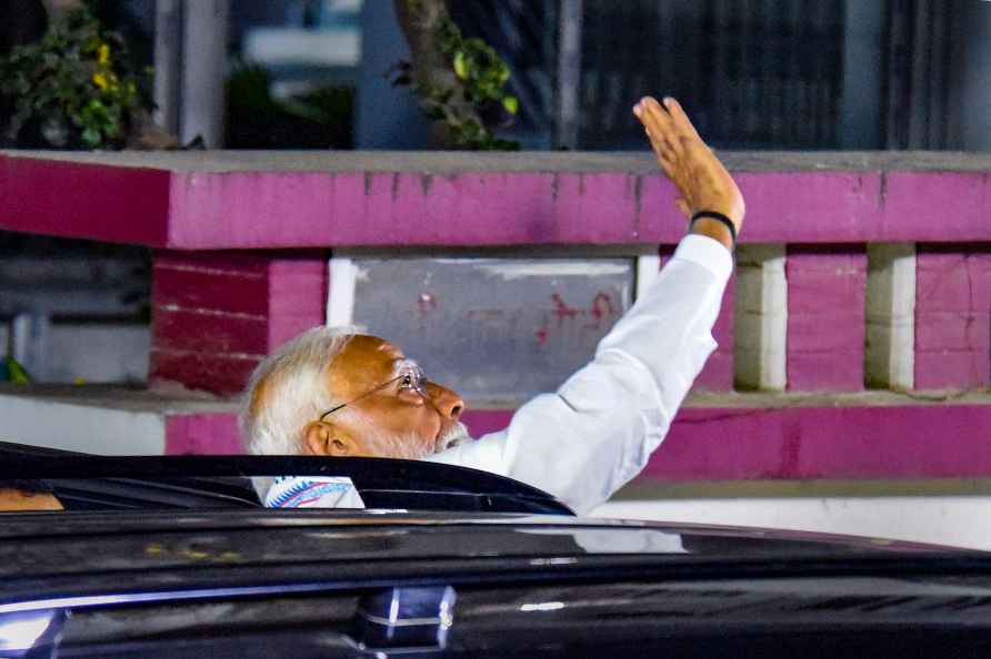 Patna: Prime Minister Narendra Modi waves at supporters during a...