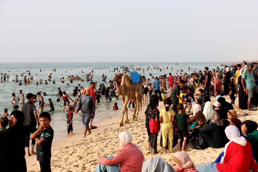 Palestinian enjoy a day along the Mediterranean Sea