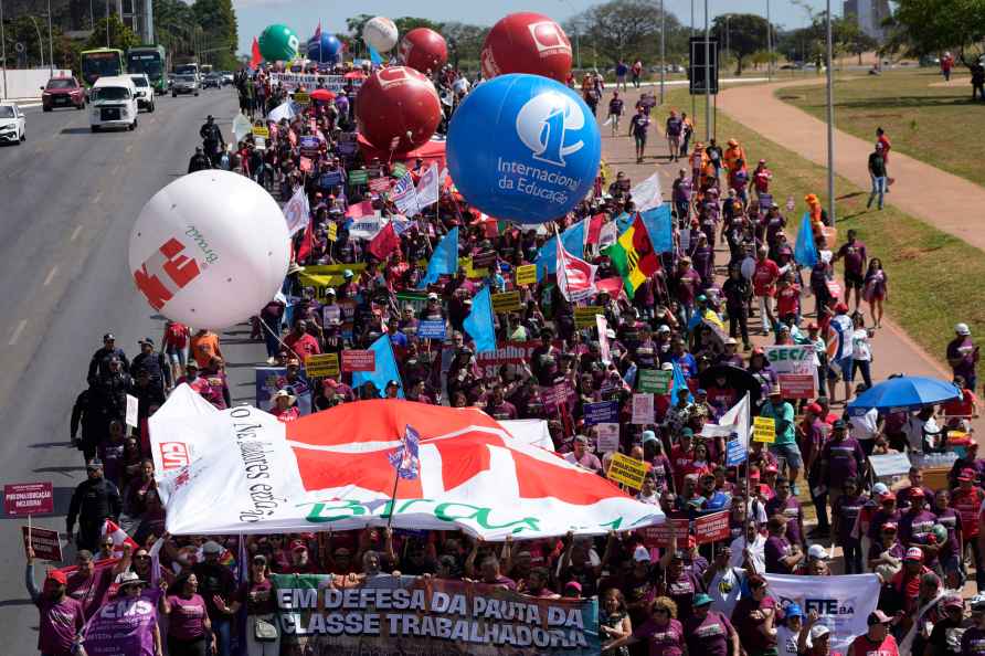 Workers and teachers attend the Working Class March