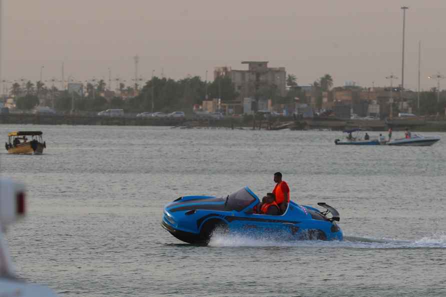 People enjoy a boat ride in Shatt al-Arab waterway, in Basra, Iraq...