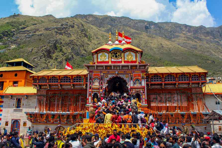 Chamoli: Devotees arrive to offer prayers at Badrinath Temple during...