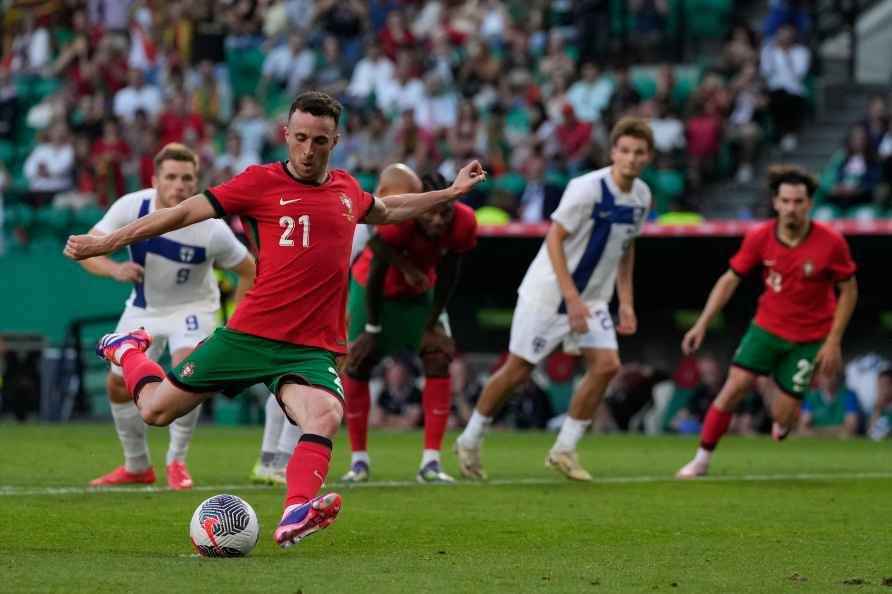 Portugal's Diogo Jota scoring from penalty the second goal against...