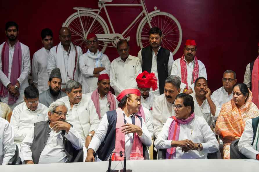 Lucknow: Samajwadi Party Chief Akhilesh Yadav with his party's newly...