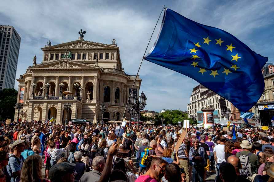 People take part in a demonstration for voting at the European election...