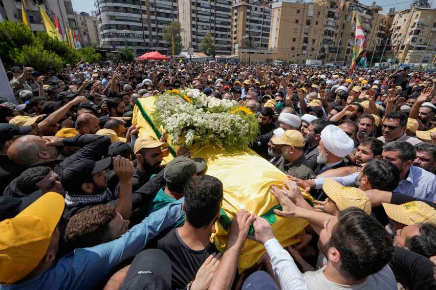 People carry the coffin of Hezbollah senior commander Taleb Sami Abdullah,