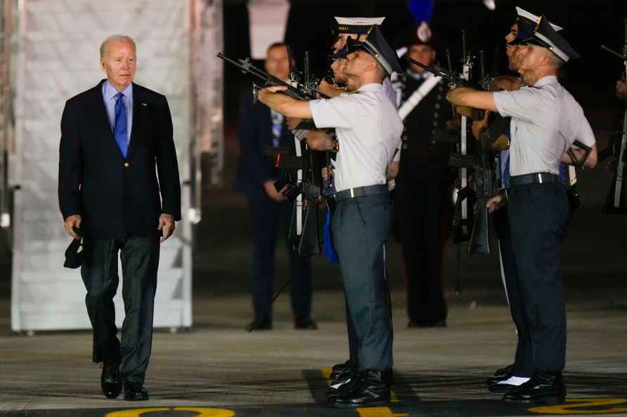 President Joe Biden leaves Air Force One as he arrives at Brindisi...