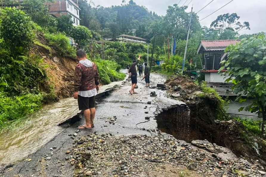 Mangan: Section of a road damaged due to landslides triggered by...