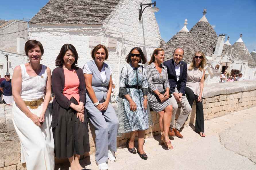 From left, Amelie Derbaudrenghien, wife of President of the European...