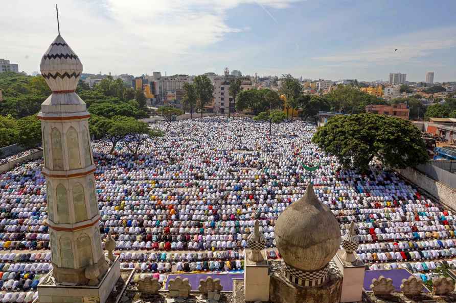 Bengaluru: Muslims offer prayers at Idgah on the occasion Eid-al...