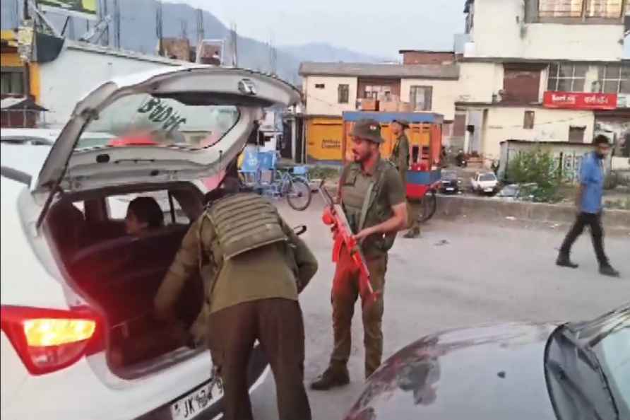 **SCREENSHOT VIA PTI VIDEO** Poonch: Security personnel check vehicles...