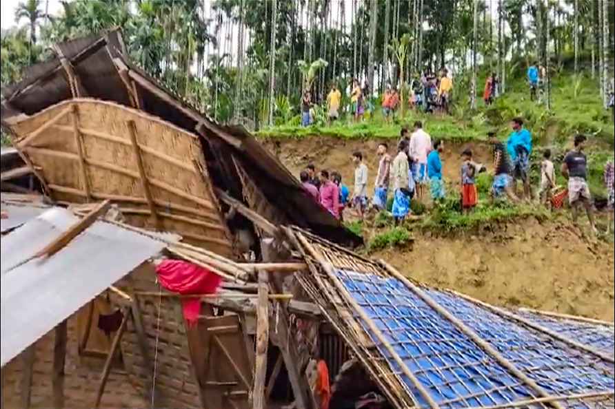 **EDS: SCREENSHOT VIA PTI VIDEO** Karimganj: A house damaged due...