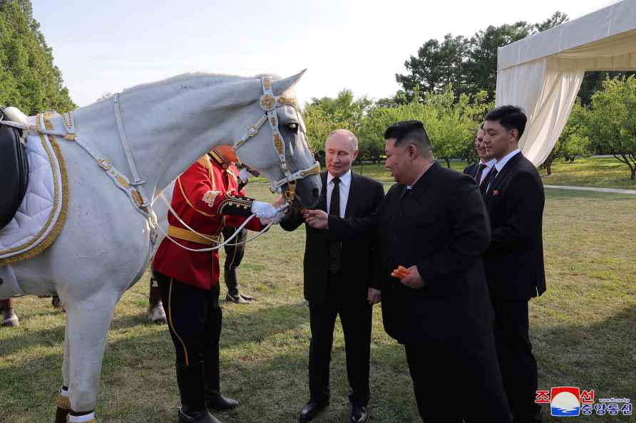 Kim Jong Un, Vladimir Putin,