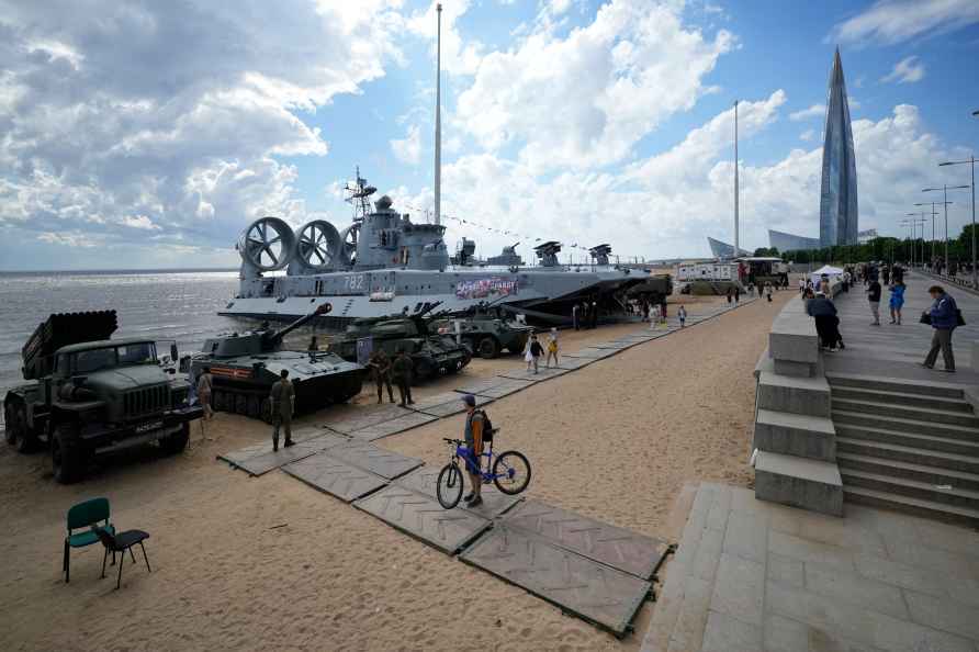 People visit a military exhibition in support Russian army