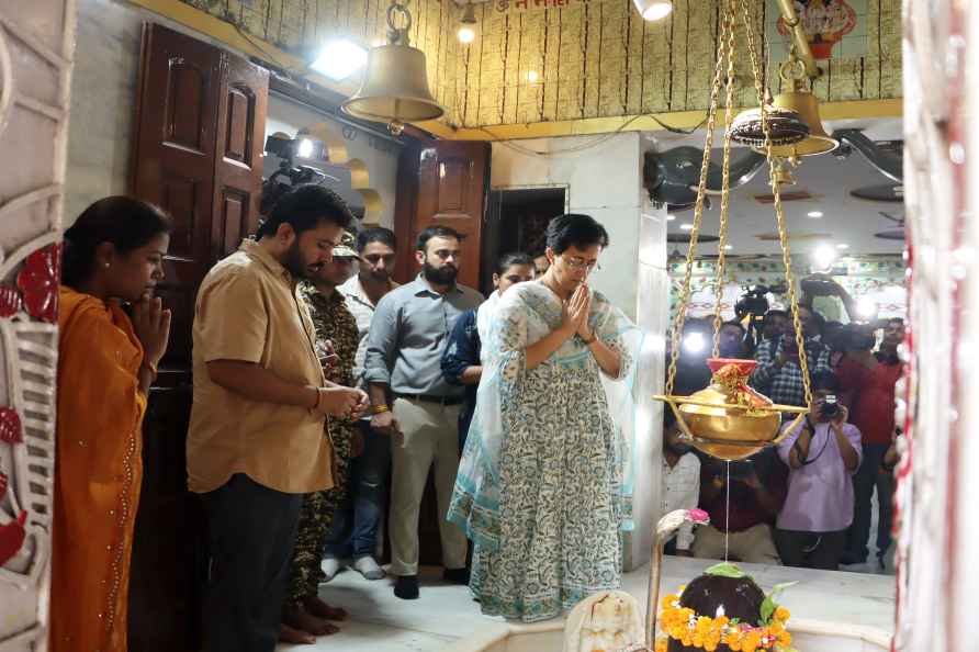 Atishi at temple during indefinite hunger strike