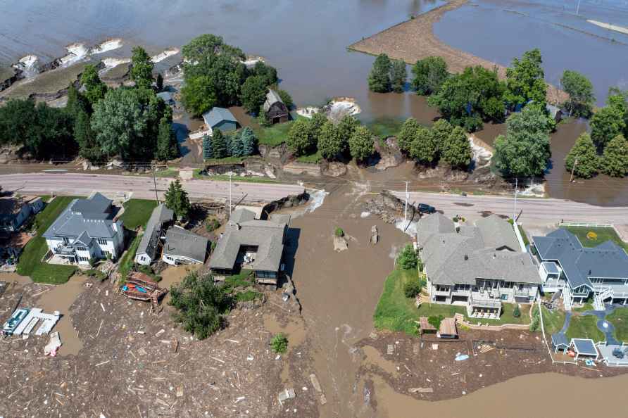 Flooding from the Big Sioux River damages roads