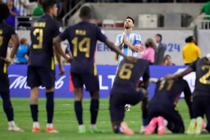 Argentina's Lionel Messi reacts during a penalty shootout against...