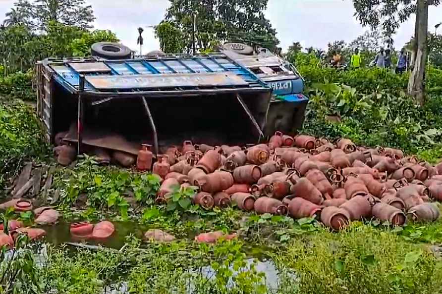 Truck with LPG cylinders overturns in Assam