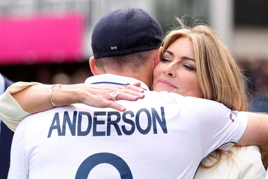 James Anderson with his wife Daniella following his final test for...