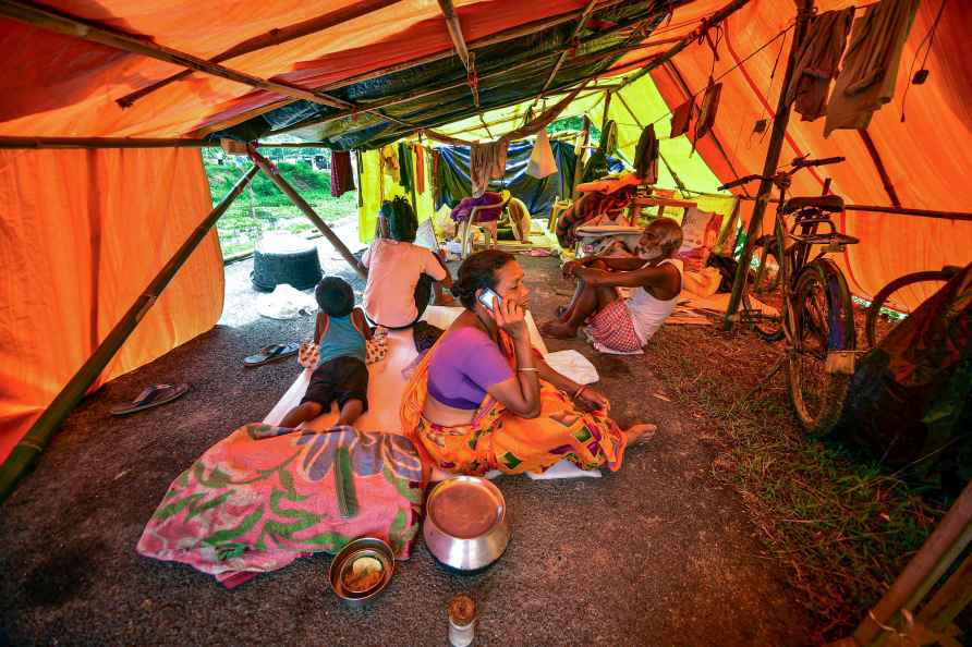 Nagaon: Residents of a flood affected area take refuge in a makeshift...