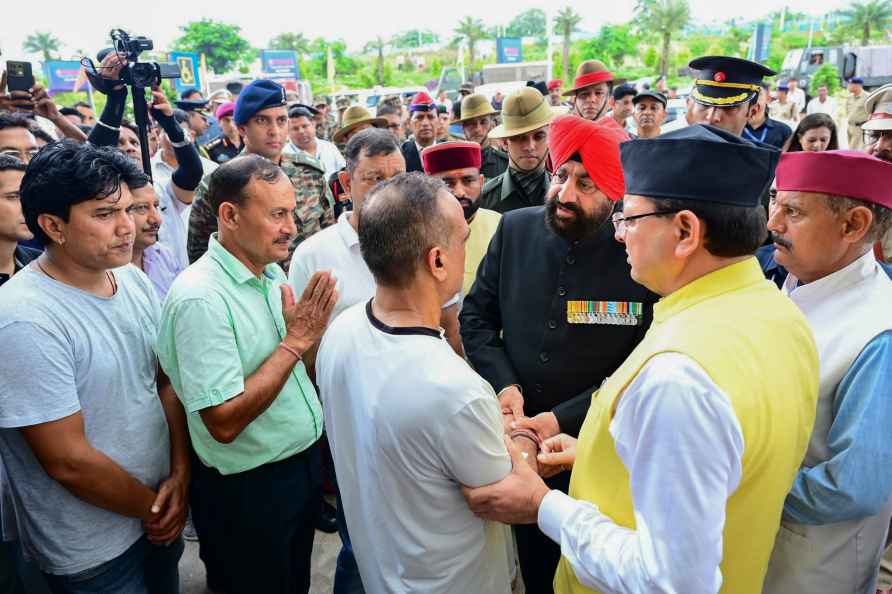 CM Dhami meets slain Army Captain's family