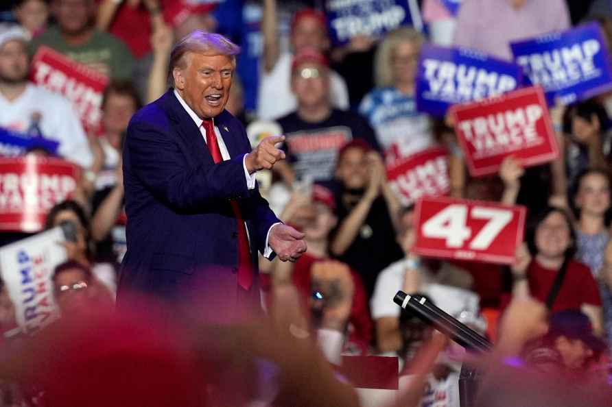 Republican presidential nominee former President Donald Trump departs...