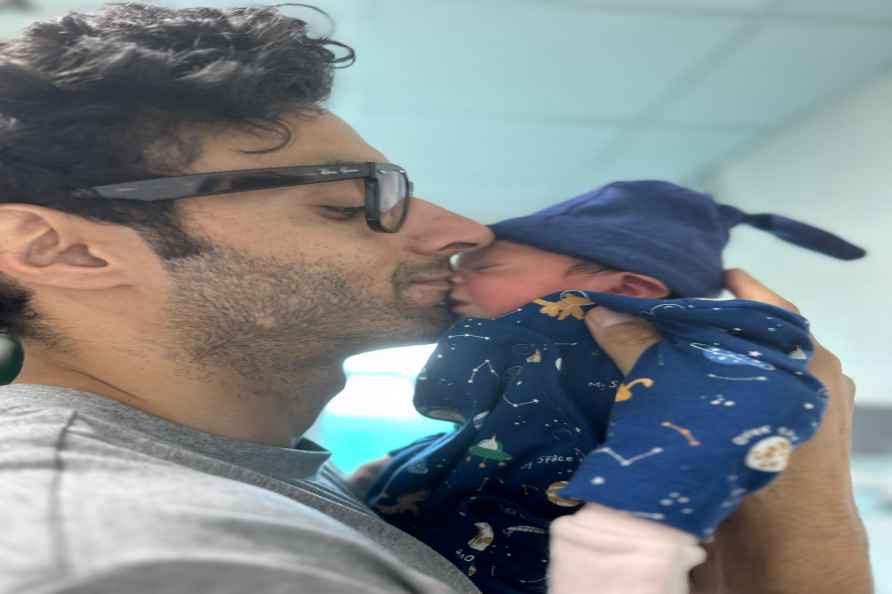 J&K Police DySP Bhat with his newborn son