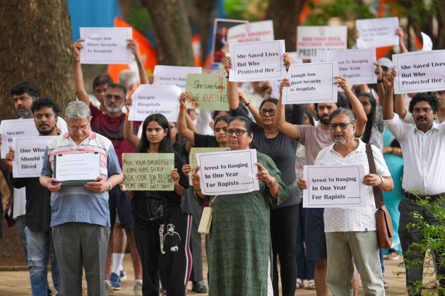 Mumbai: People stage a protest against the alleged rape and murder...