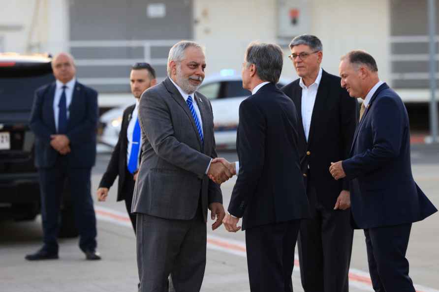 U.S. Secretary of State Antony Blinken shakes hands with Israeli...