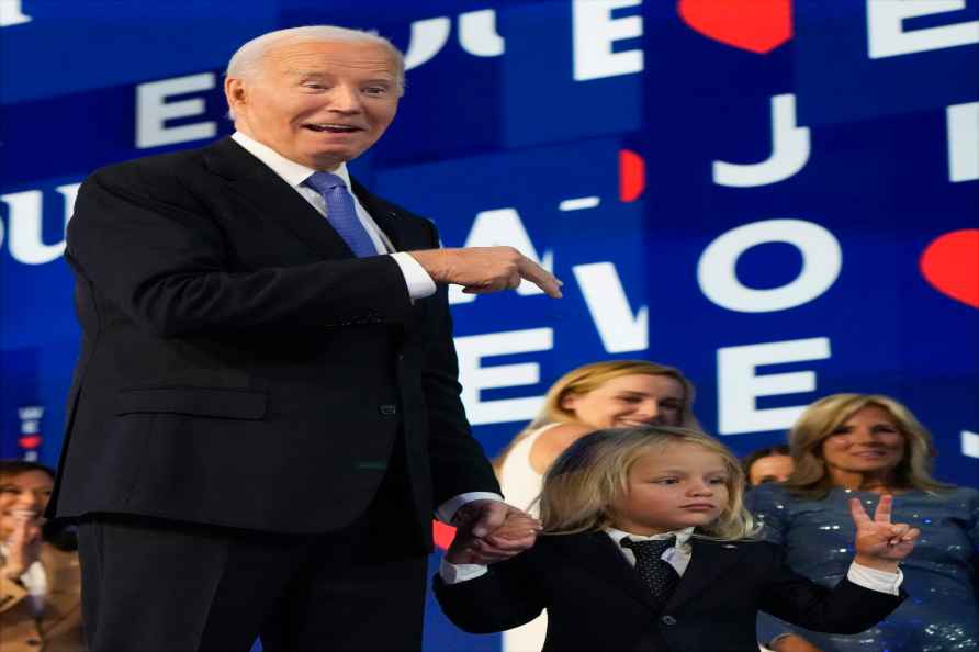 President Joe Biden gestures to his grandson Beau Biden during the...