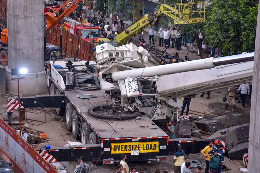 Crane falls onto building in Surat