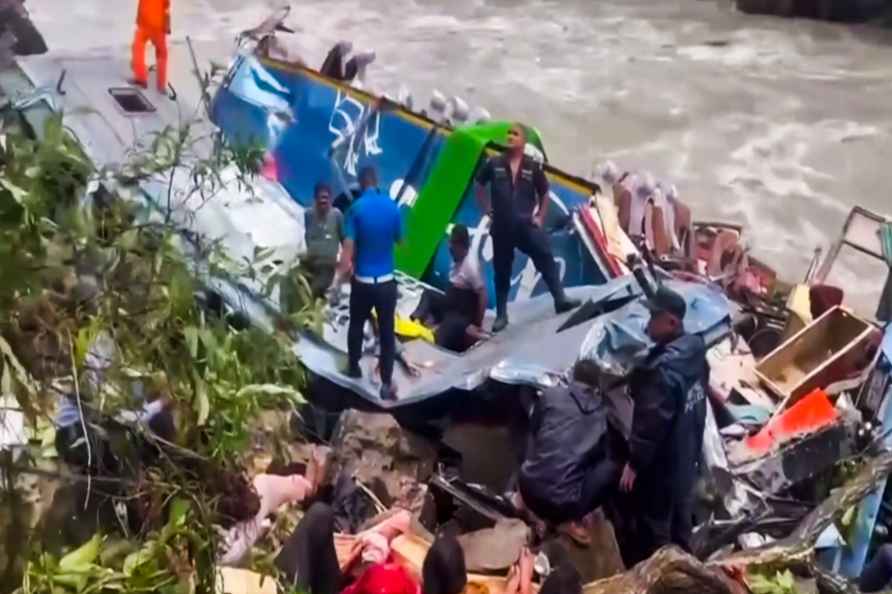 Indian bus falls into river in Nepal