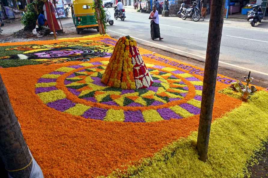 Thiruvananthapuram: A giant 'pookkalam' (floral carpets) laid as...