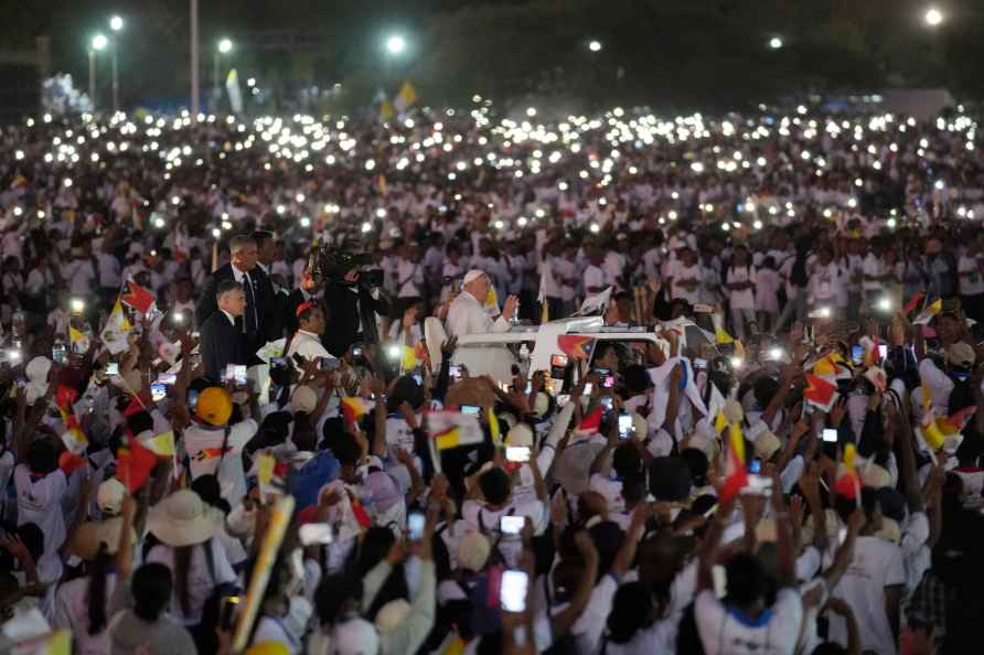 Pope Francis leaves after leading a holy mass