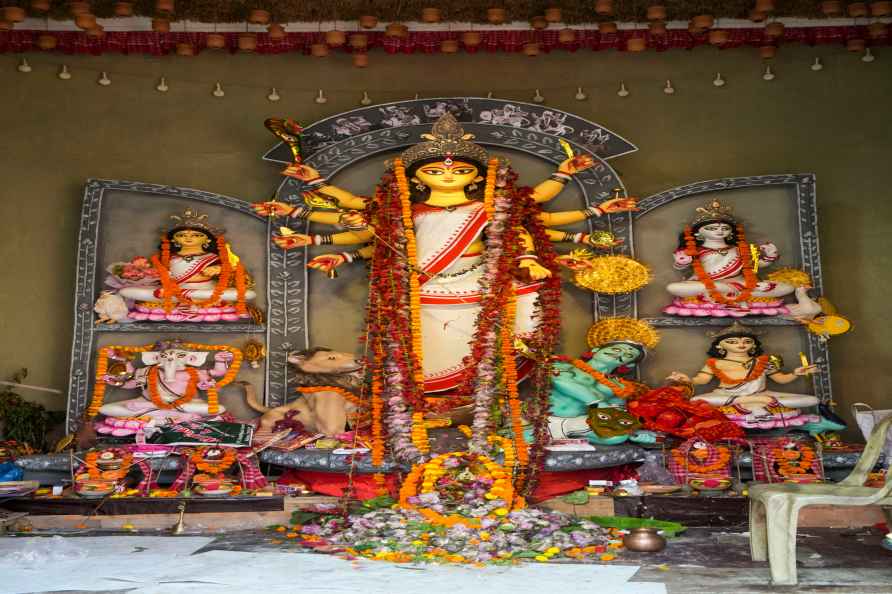 Kolkata: Goddess Durga idols at a community 'puja pandal' during...