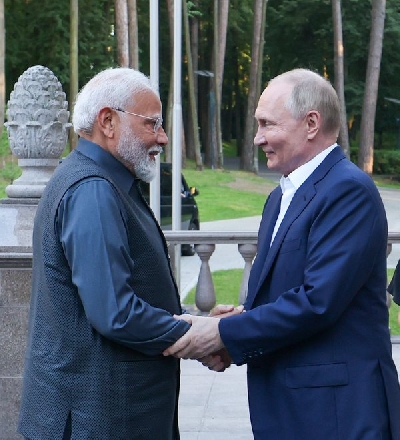 President Putin hosts PM Modi at his official residence 